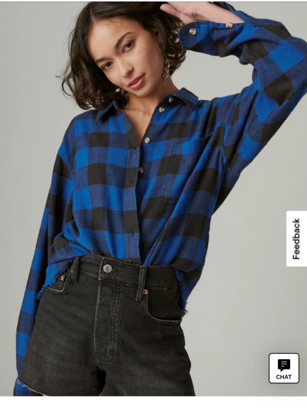 Distressed plaid flannel shirt